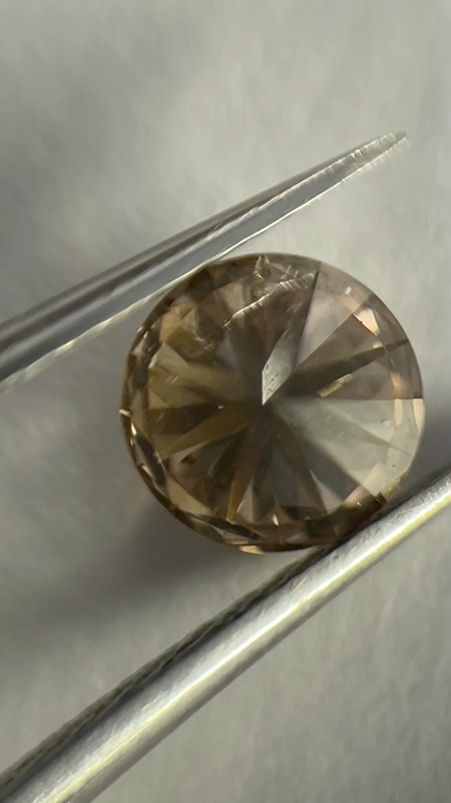 A round brilliant diamond on the desk